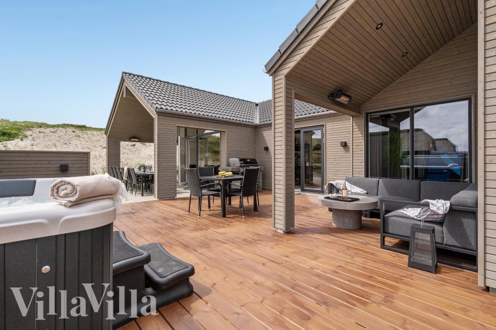 Das Luxusferienhaus Nr. 541 hat eine tolle Terrasse, die mit hochwertigen Gartenmöbeln für 18 Personen ausgestattet ist.