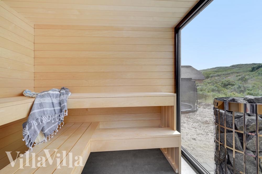 Genießen Sie die heiße Sauna im Luxusferienhaus Nr. 541 für 18 Personen