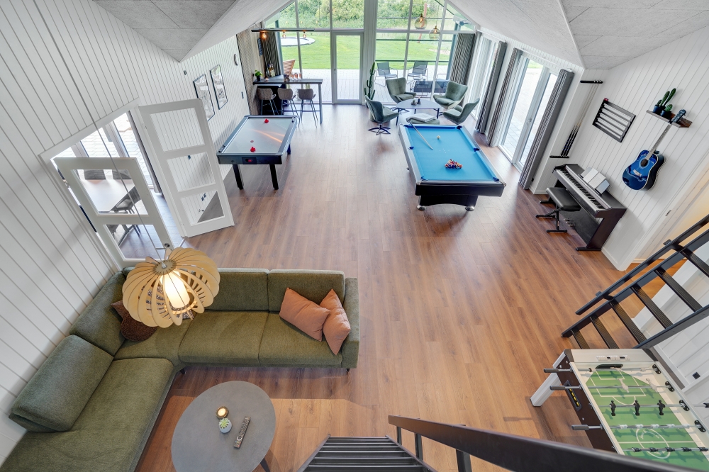 Neben den vielen schönen Stunden, die man im Poolbereich des Hauses verbringen kann, bietet das Luxusferienhaus 546 auch Spielevergnügen bei Billard/Tischtennis und Darts