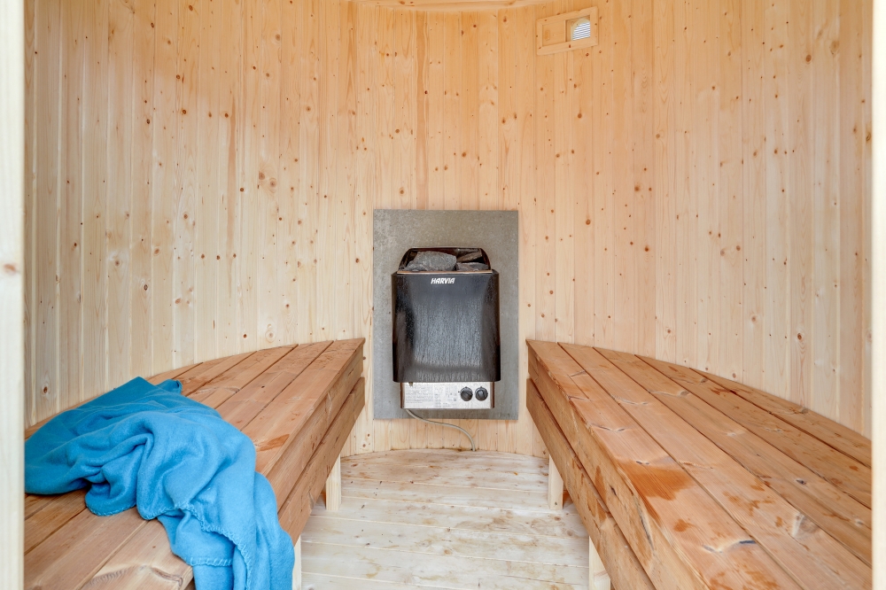 Genießen Sie die heiße Sauna im Luxusferienhaus Nr. 544 für 14 Personen