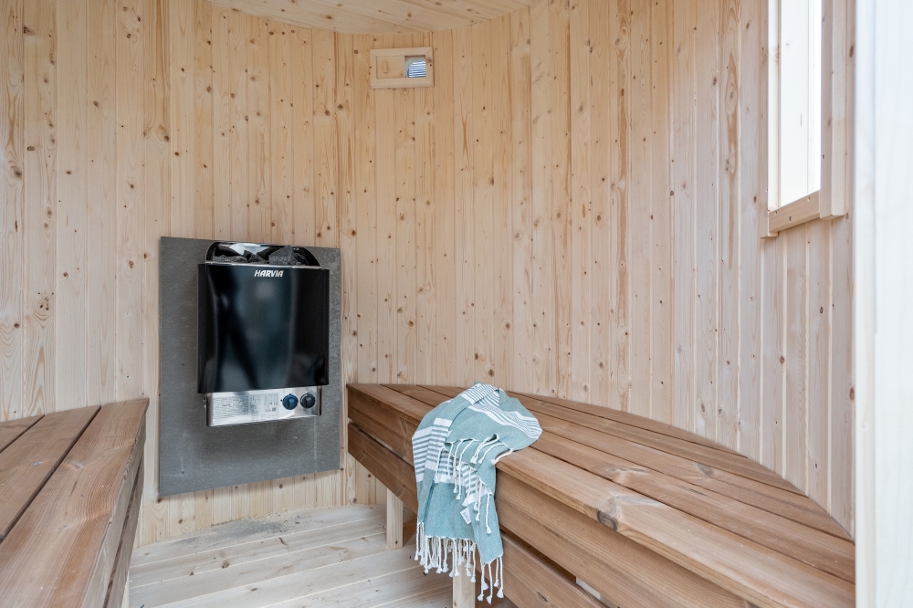 Genießen Sie die heiße Sauna im Luxusferienhaus Nr. 549 für 14 Personen