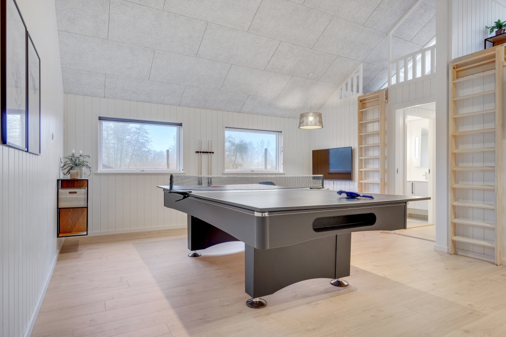 Neben den vielen schönen Stunden, die man im Poolbereich des Hauses verbringen kann, bietet das Luxusferienhaus 549 auch Spielevergnügen bei Billard/Tischtennis und Darts