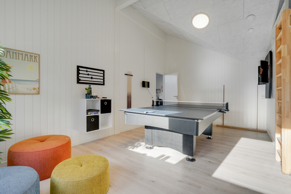 Aktivitätsraum im Luxusferienhaus Nr. 540 mit 5 Schlafzimmern und Platz für 14 Gäste.