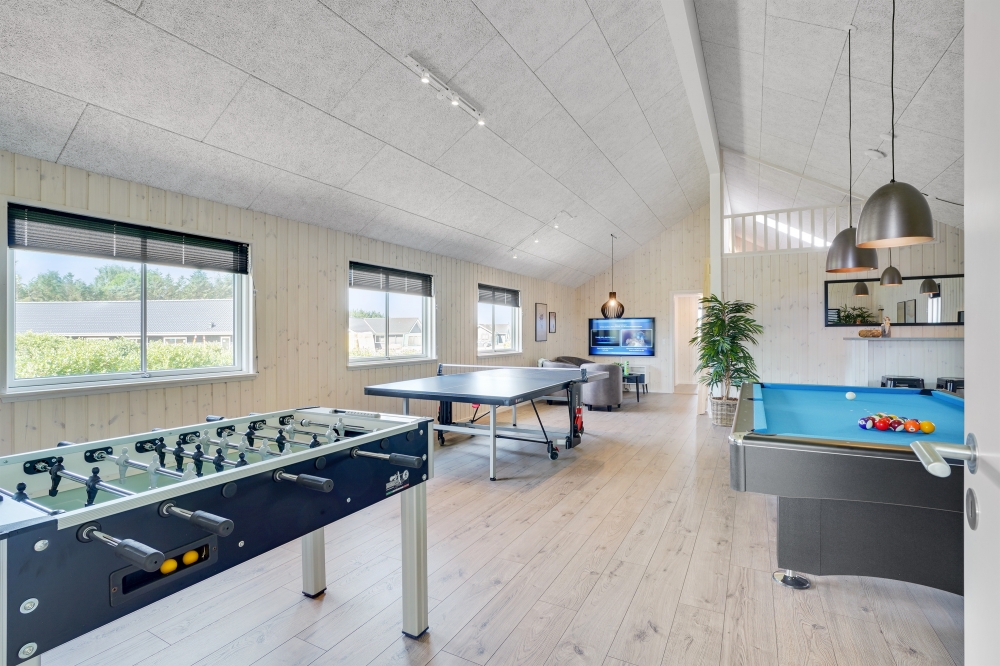 Neben den vielen schönen Stunden, die man im Poolbereich des Hauses verbringen kann, bietet das Luxusferienhaus 547 auch Spielevergnügen bei Billard/Tischtennis und Darts