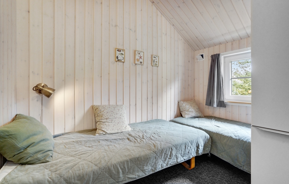 Eines der 6 Schlafzimmer im Luxusferienhaus Nr. 570