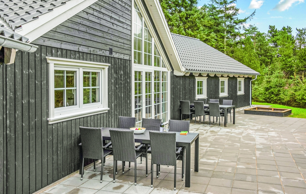 Das Luxusferienhaus Nr. 570 hat eine tolle Terrasse, die mit hochwertigen Gartenmöbeln für 14 Personen ausgestattet ist.