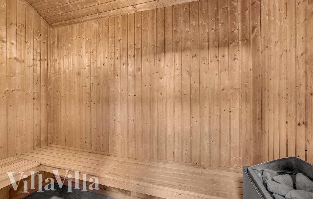 Genießen Sie die heiße Sauna im Luxusferienhaus Nr. 571 für 22 Personen