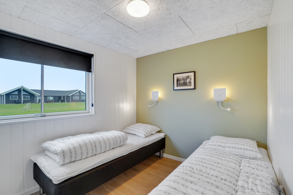 Eines der 9 Schlafzimmer im Luxusferienhaus Nr. 551