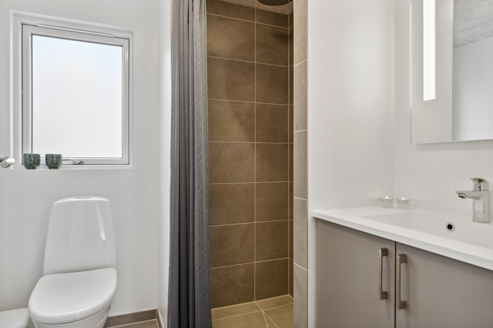 Eines der Badezimmer im Luxusferienhaus Nr. 577