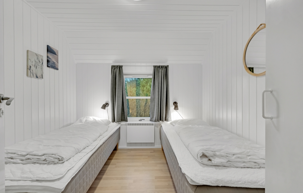 Eines der 6 Schlafzimmer im Luxusferienhaus Nr. 552