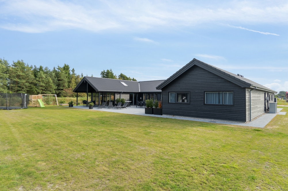 Dieses schöne Poolhaus Nr. 554 mit Platz für 26 Personen liegt in Westjütland
