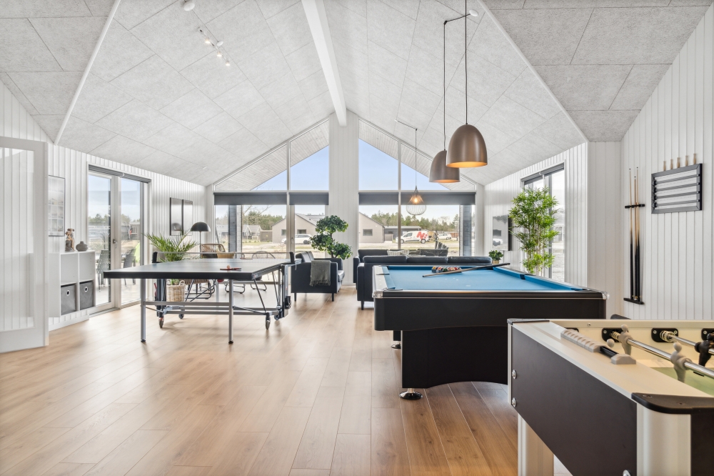 Neben den vielen schönen Stunden, die man im Poolbereich des Hauses verbringen kann, bietet das Luxusferienhaus 579 auch Spielevergnügen bei Billard/Tischtennis und Darts