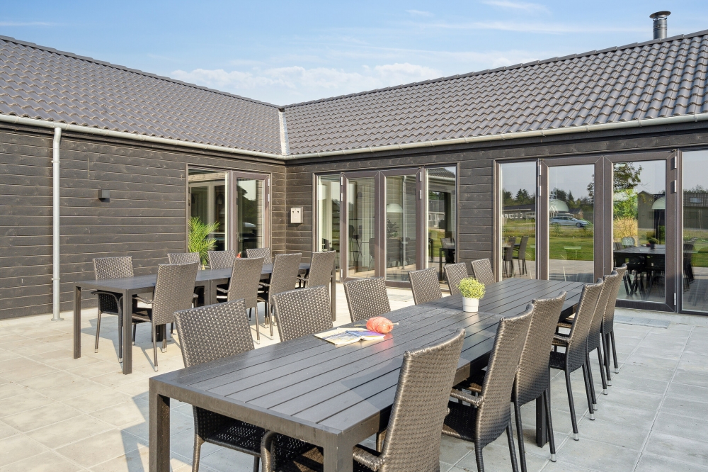 Genießen Sie einen Grillabend auf der Terrasse des Luxusferienhauses Nr. 579 in Westjütland