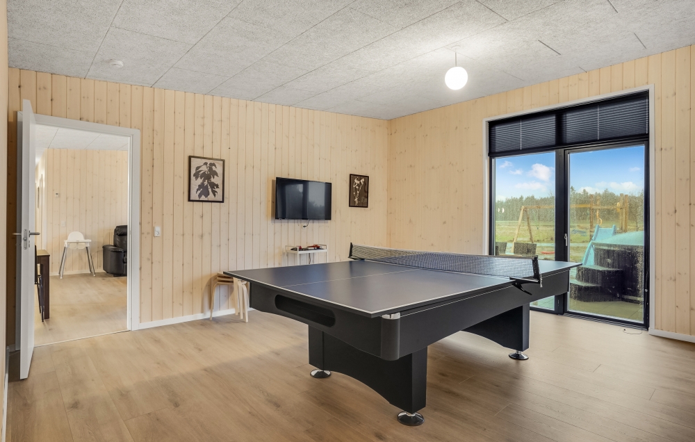 Neben den vielen schönen Stunden, die man im Poolbereich des Hauses verbringen kann, bietet das Luxusferienhaus 581 auch Spielevergnügen bei Billard/Tischtennis und Darts