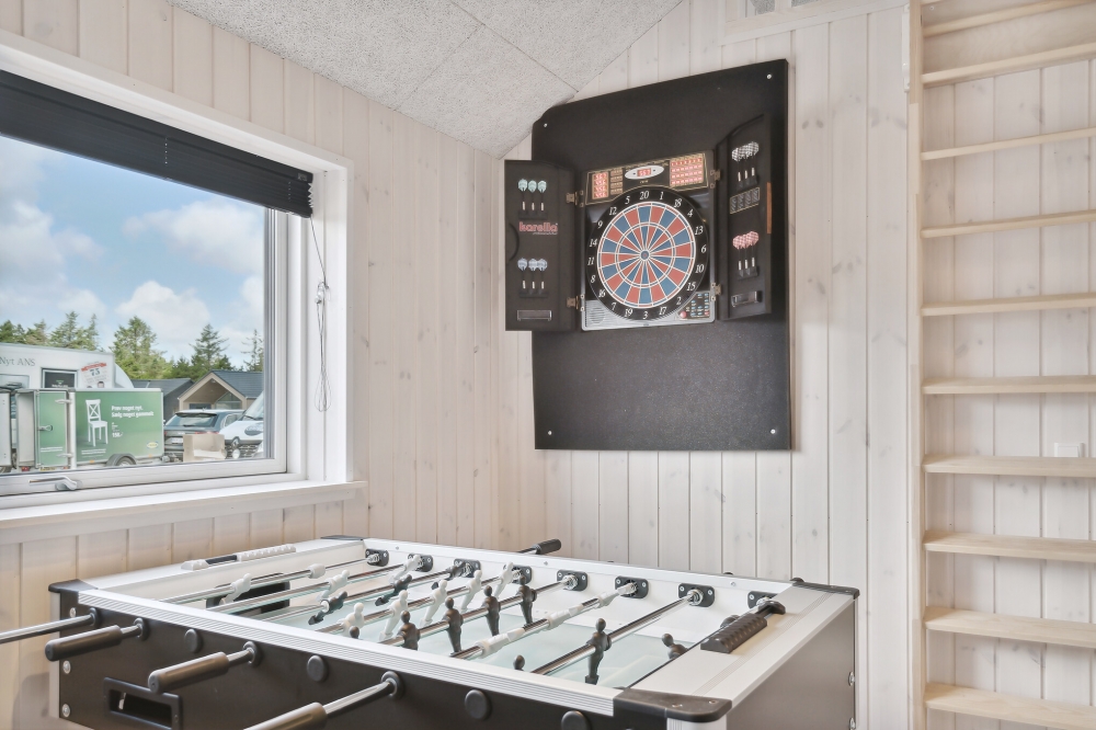 Aktivitätsraum im Luxusferienhaus Nr. 601 mit 7 Schlafzimmern und Platz für 18 Gäste.