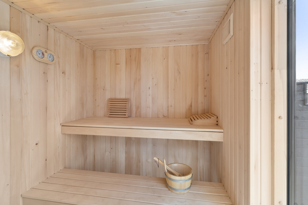 Genießen Sie die heiße Sauna im Luxusferienhaus Nr. 601 für 18 Personen