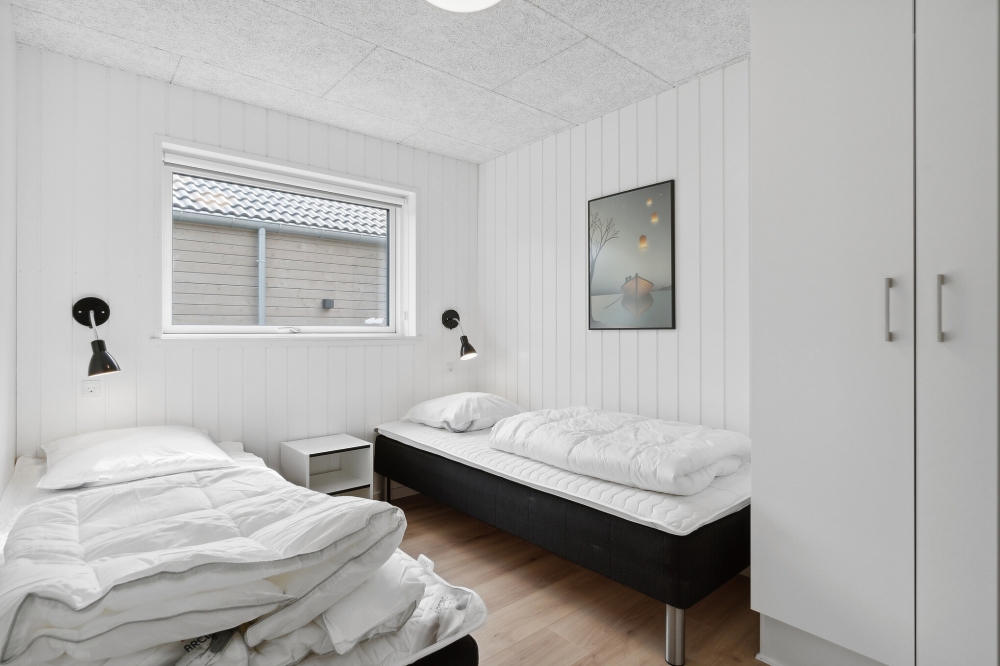 Eines der 7 Schlafzimmer im Luxusferienhaus Nr. 590
