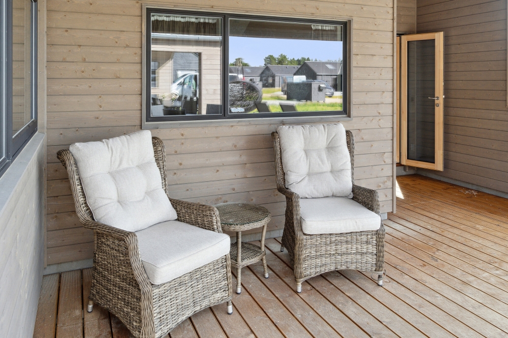 Genießen Sie einen Grillabend auf der Terrasse des Luxusferienhauses Nr. 590 in Südjütland