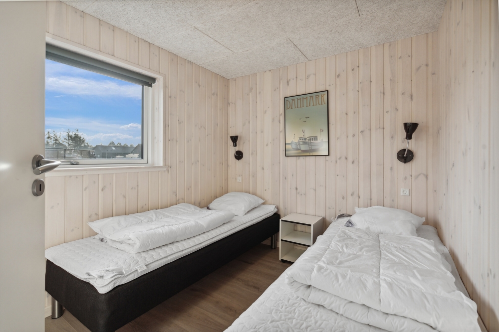 Eines der 8 Schlafzimmer im Luxusferienhaus Nr. 591