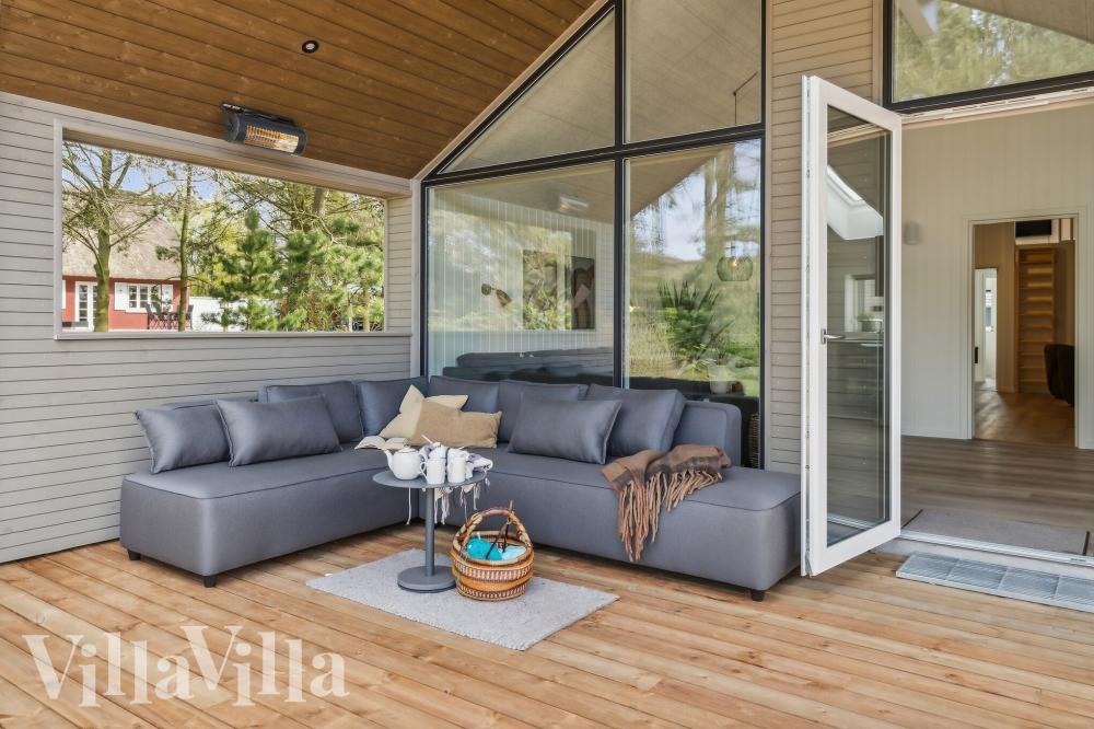 Das Luxusferienhaus Nr. 593 hat eine tolle Terrasse, die mit hochwertigen Gartenmöbeln für 14 Personen ausgestattet ist.