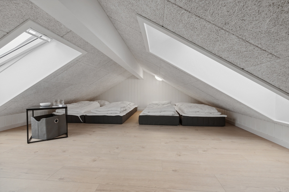 Der große ausgebaute Dachboden im Luxusferienhaus Nr. 596 für 20 Personen