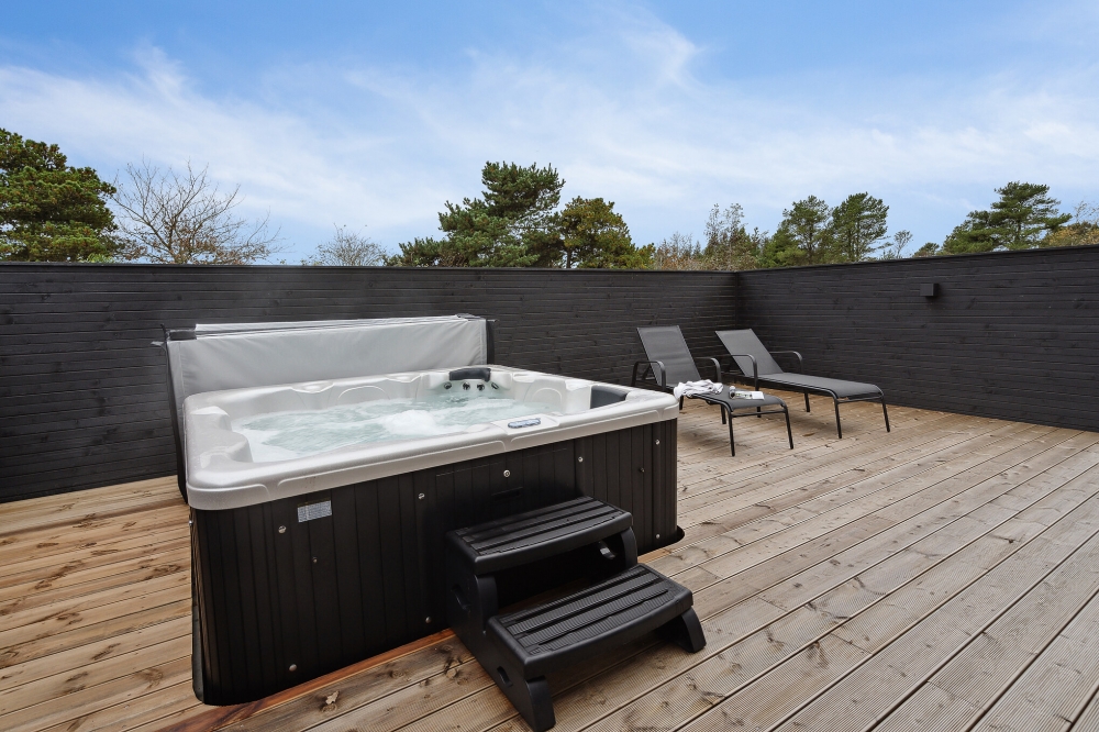 Das Luxusferienhaus Nr. 596 bietet u. a. einen tollen Whirlpool