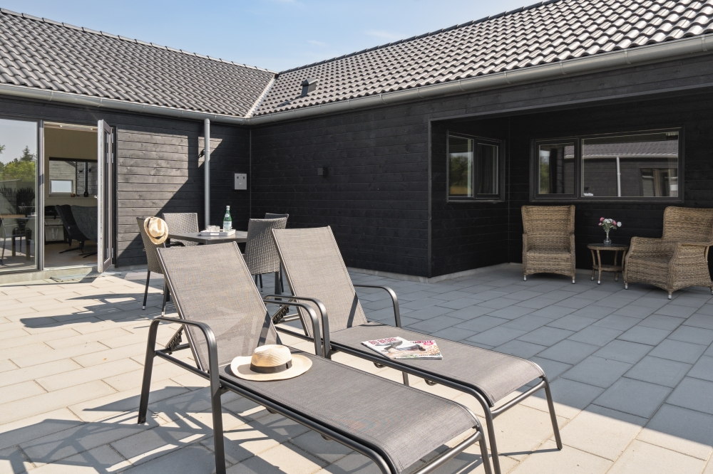 Genießen Sie einen Grillabend auf der Terrasse des Luxusferienhauses Nr. 598 in Südjütland