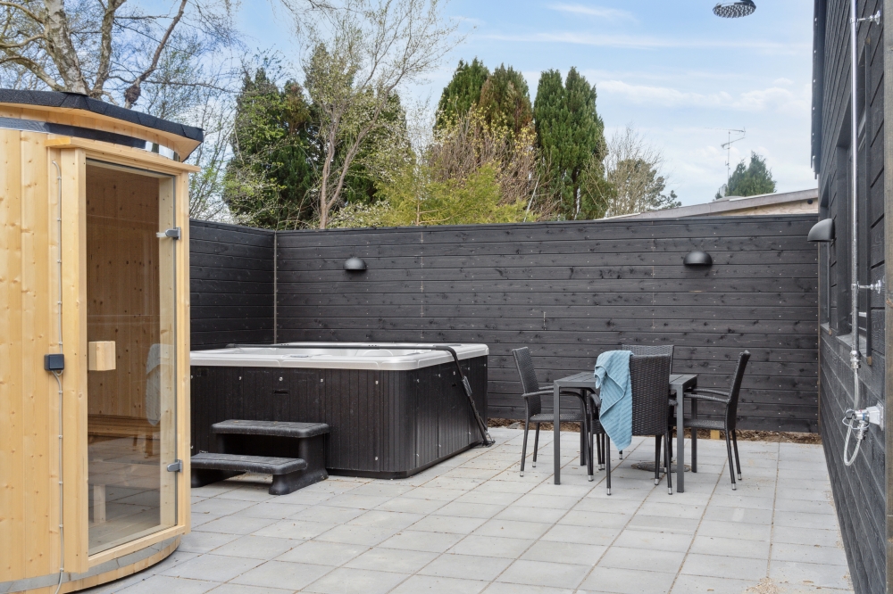 Genießen Sie einen Grillabend auf der Terrasse des Luxusferienhauses Nr. 584 in Nordseeland