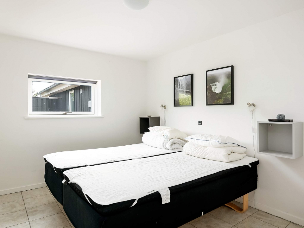 Eines der 10 Schlafzimmer im Luxusferienhaus Nr. 602