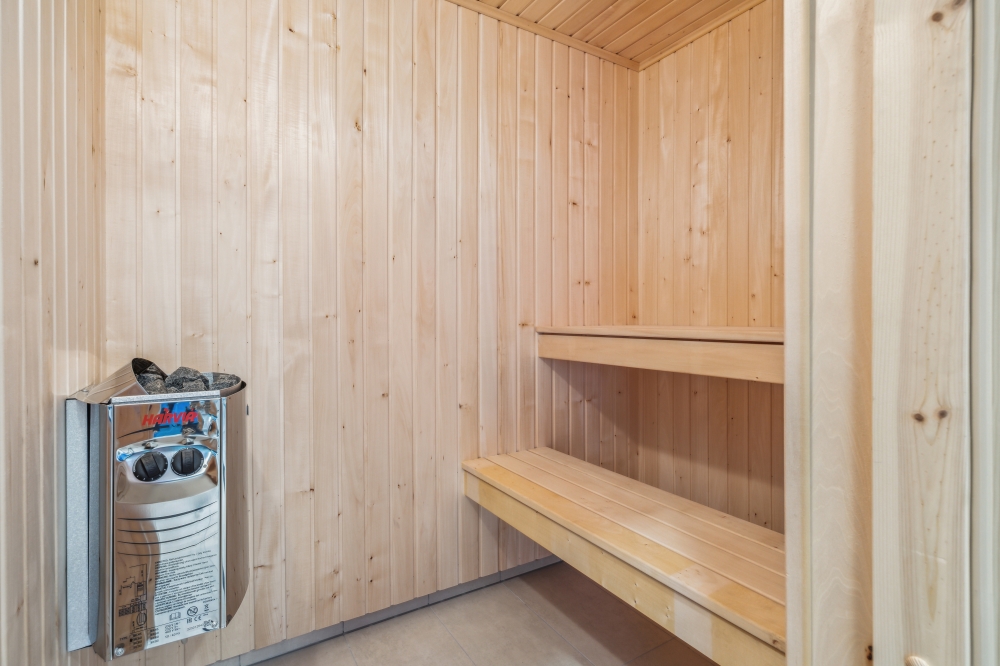 Genießen Sie die heiße Sauna im Luxusferienhaus Nr. 750 für 18 Personen