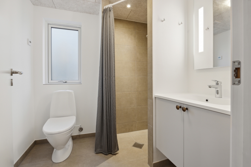 Eines der Badezimmer im Luxusferienhaus Nr. 751