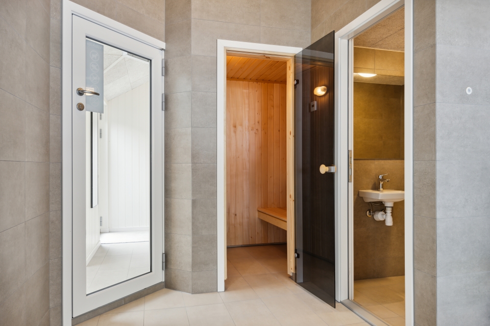 Genießen Sie die heiße Sauna im Luxusferienhaus Nr. 755 für 16 Personen