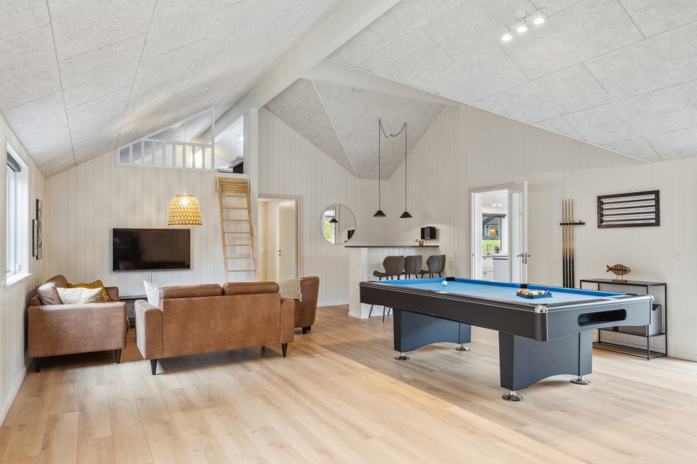Neben den vielen schönen Stunden, die man im Poolbereich des Hauses verbringen kann, bietet das Luxusferienhaus 758 auch Spielevergnügen bei Billard/Tischtennis und Darts