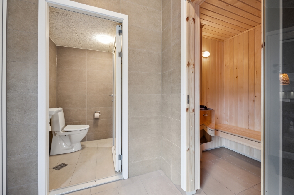 Genießen Sie die heiße Sauna im Luxusferienhaus Nr. 758 für 22 Personen