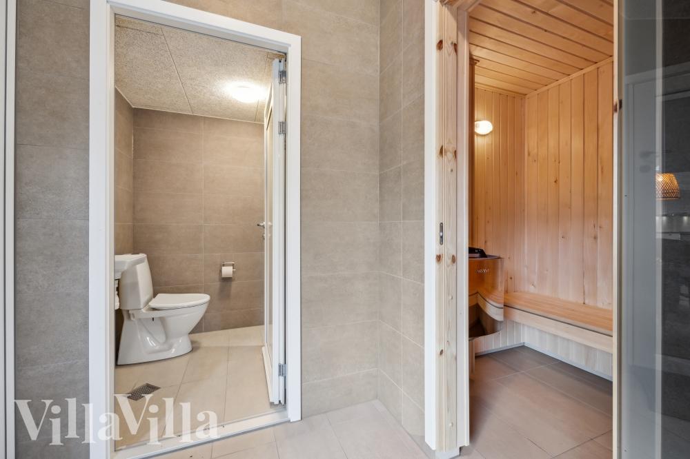 Genießen Sie die heiße Sauna im Luxusferienhaus Nr. 758 für 22 Personen