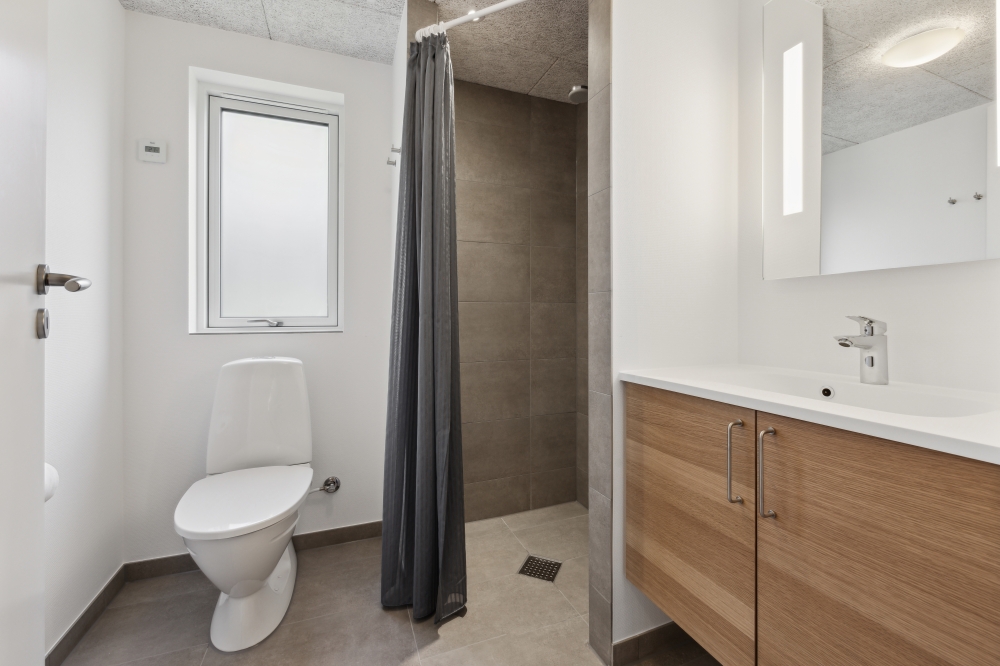 Eines der Badezimmer im Luxusferienhaus Nr. 759