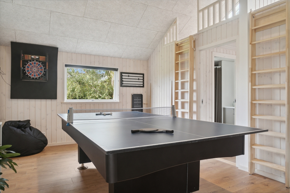 Aktivitätsraum im Luxusferienhaus Nr. 588 mit 5 Schlafzimmern und Platz für 14 Gäste.