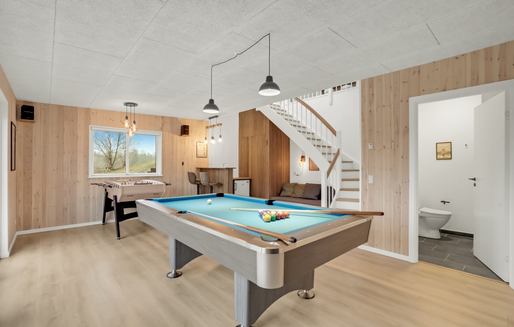 Neben den vielen schönen Stunden, die man im Poolbereich des Hauses verbringen kann, bietet das Luxusferienhaus 603 auch Spielevergnügen bei Billard/Tischtennis und Darts