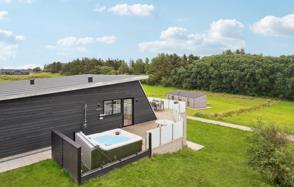 Im Luxusferienhaus Nr. 603 gibt es einen Whirlpool und 4 Schlafzimmer.