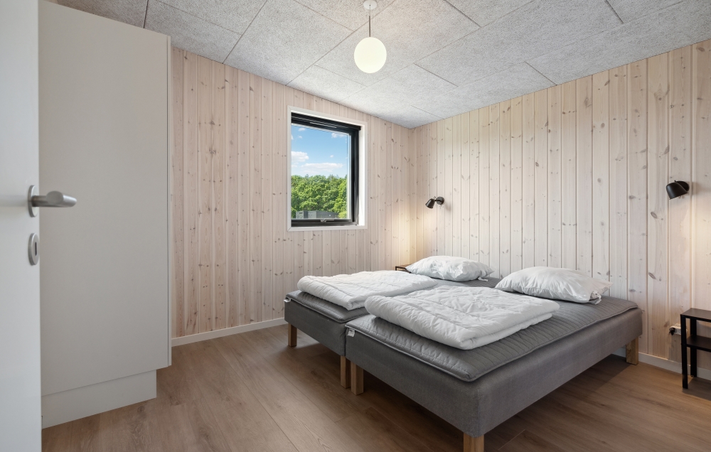 Eines der 7 Schlafzimmer im Luxusferienhaus Nr. 604