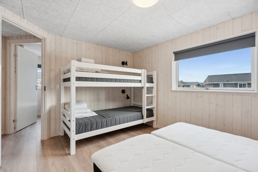 Eines der 9 Schlafzimmer im Luxusferienhaus Nr. 605