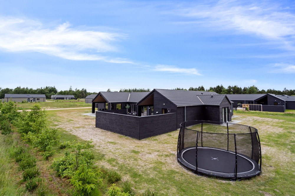 Dieses schöne Poolhaus Nr. 605 mit Platz für 24 Personen liegt in Westjütland