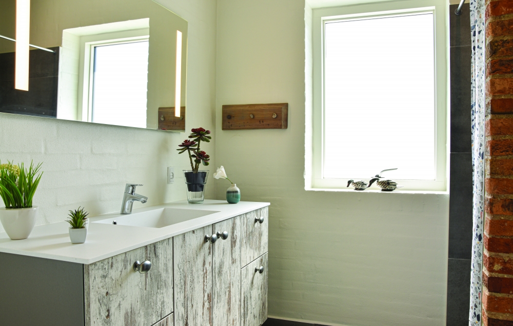 Eines der Badezimmer im Luxusferienhaus Nr. 607