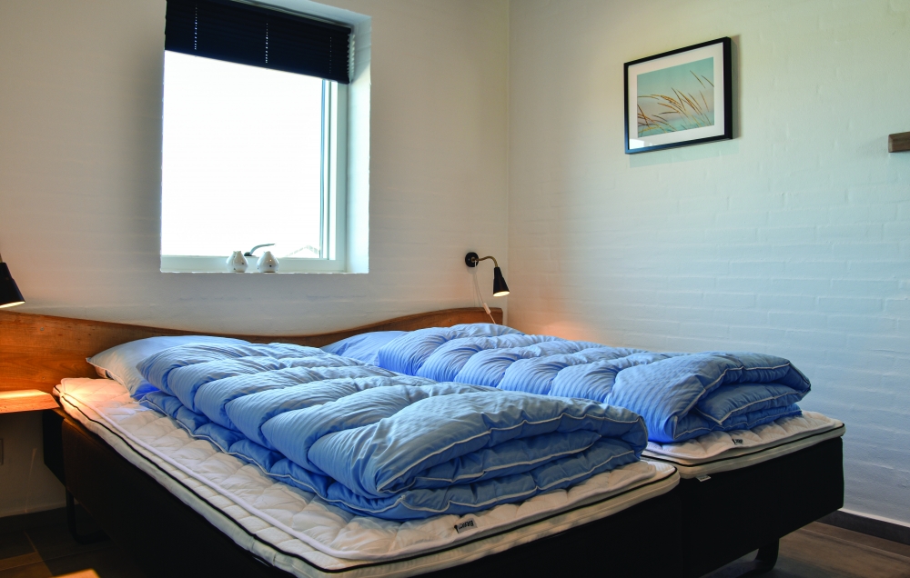 Eines der 8 Schlafzimmer im Luxusferienhaus Nr. 607