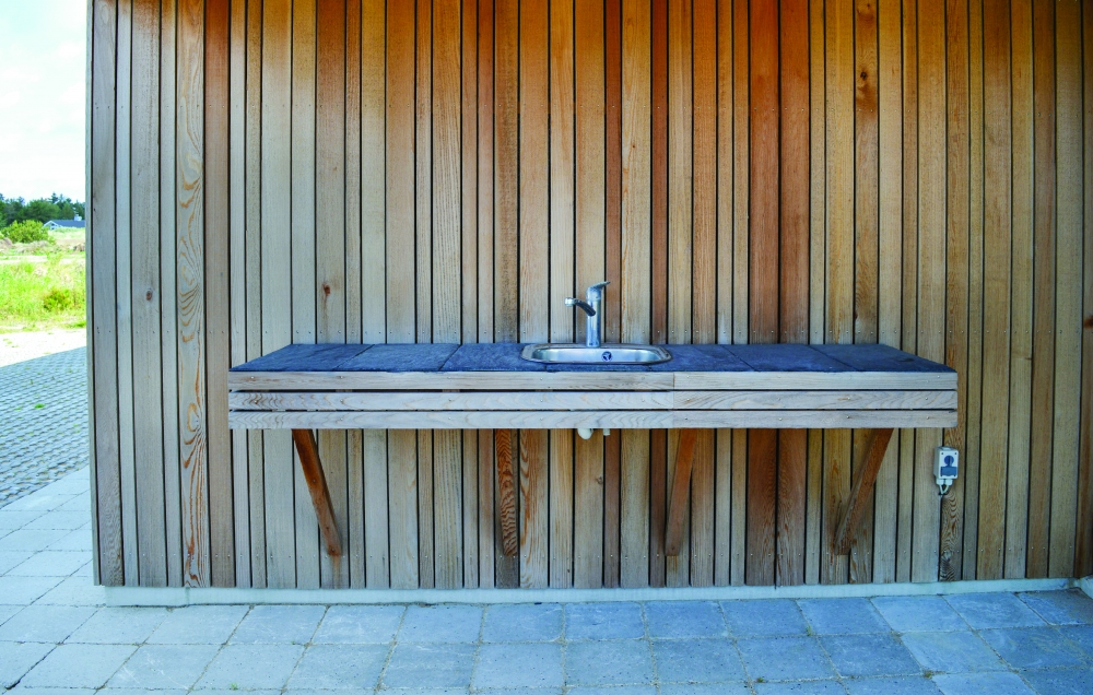 Genießen Sie einen Grillabend auf der Terrasse des Luxusferienhauses Nr. 607 in Nordjütland