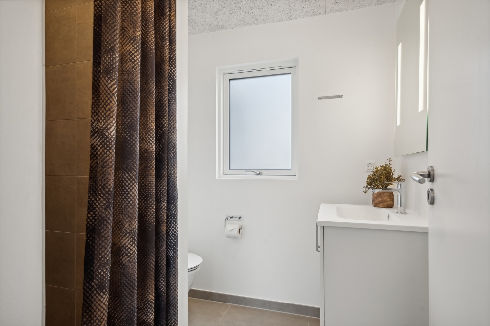 Eines der Badezimmer im Luxusferienhaus Nr. 610