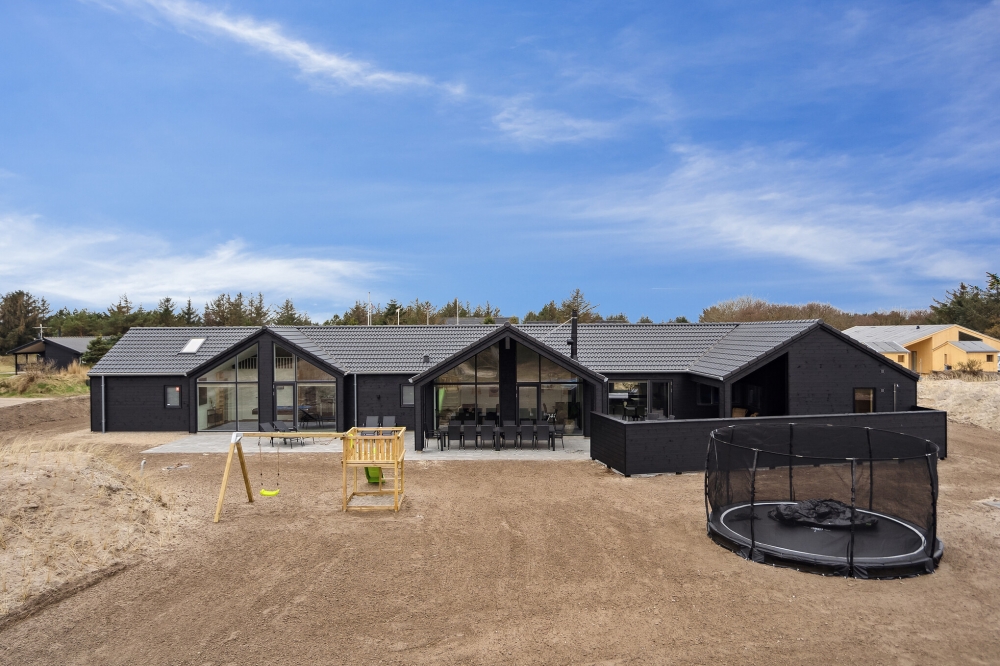 Dieses schöne Poolhaus Nr. 610 mit Platz für 18 Personen liegt in Westjütland