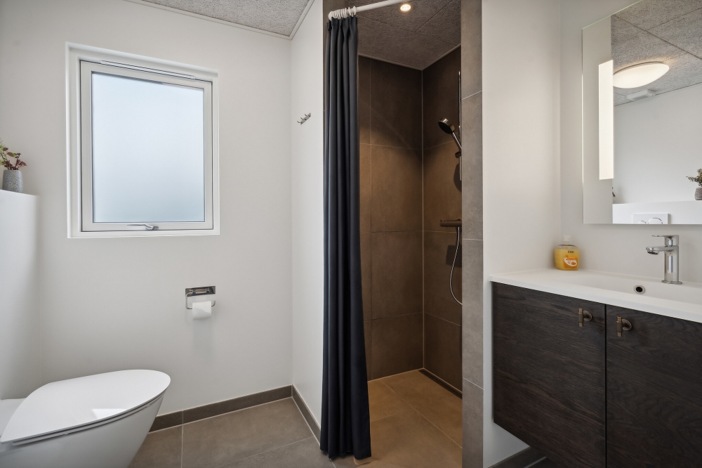 Eines der Badezimmer im Luxusferienhaus Nr. 611