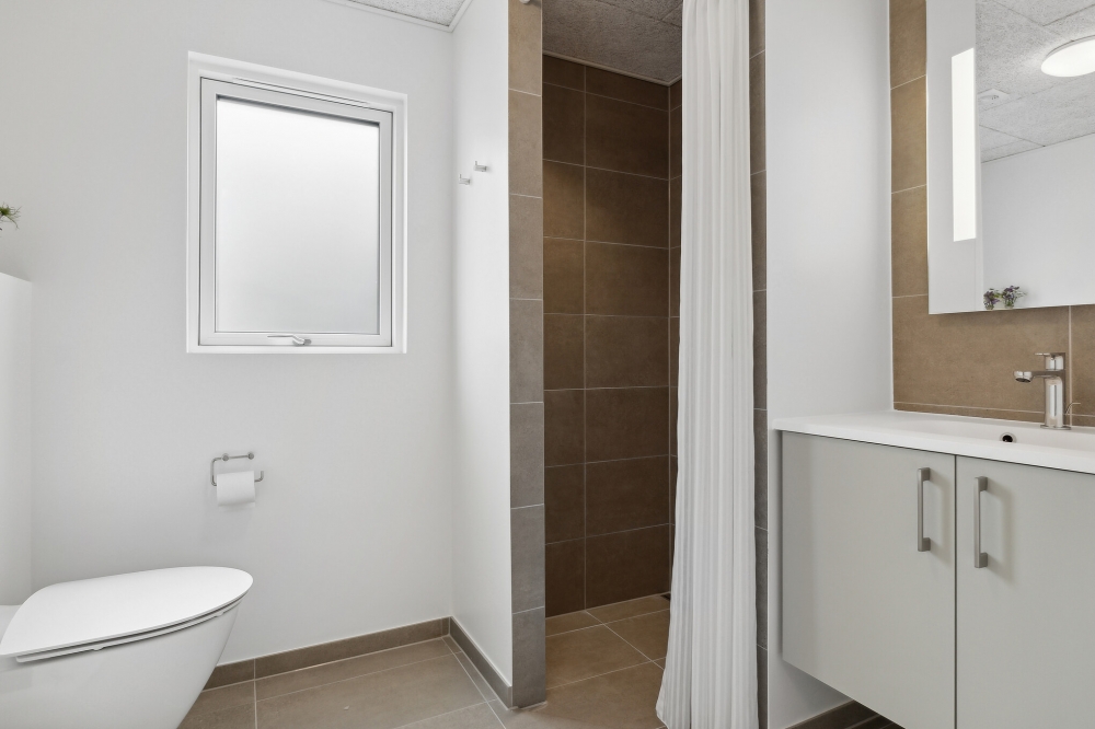 Eines der Badezimmer im Luxusferienhaus Nr. 615