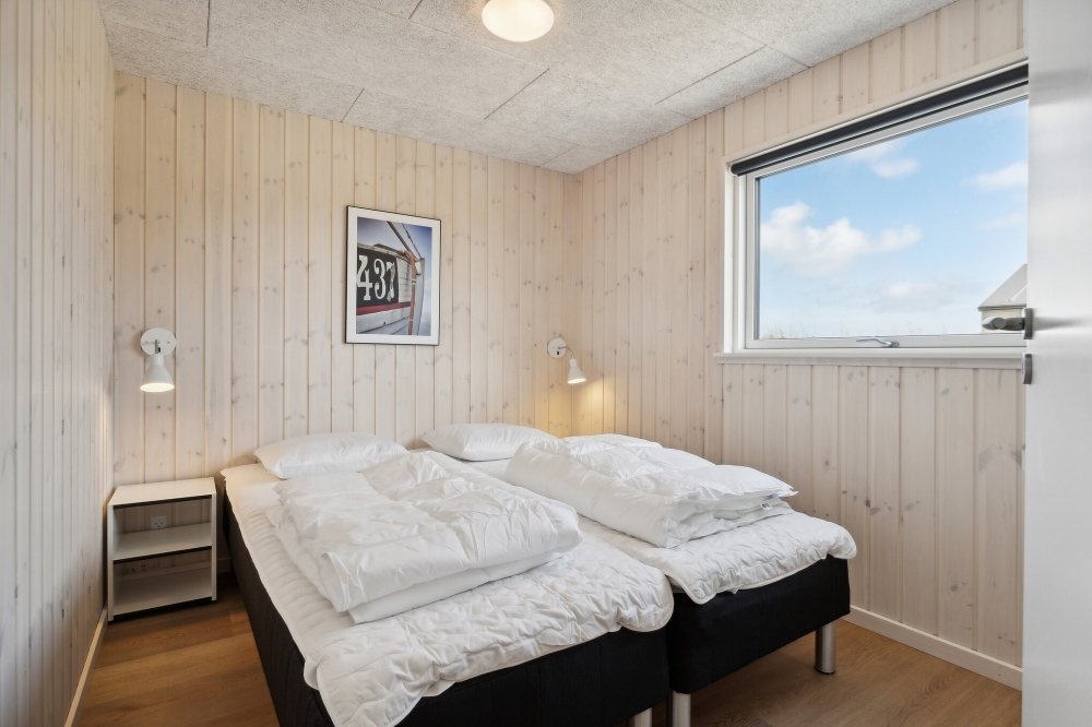 Eines der 12 Schlafzimmer im Luxusferienhaus Nr. 615